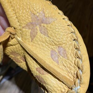Elegant Yellow Moccasins with Floral Design